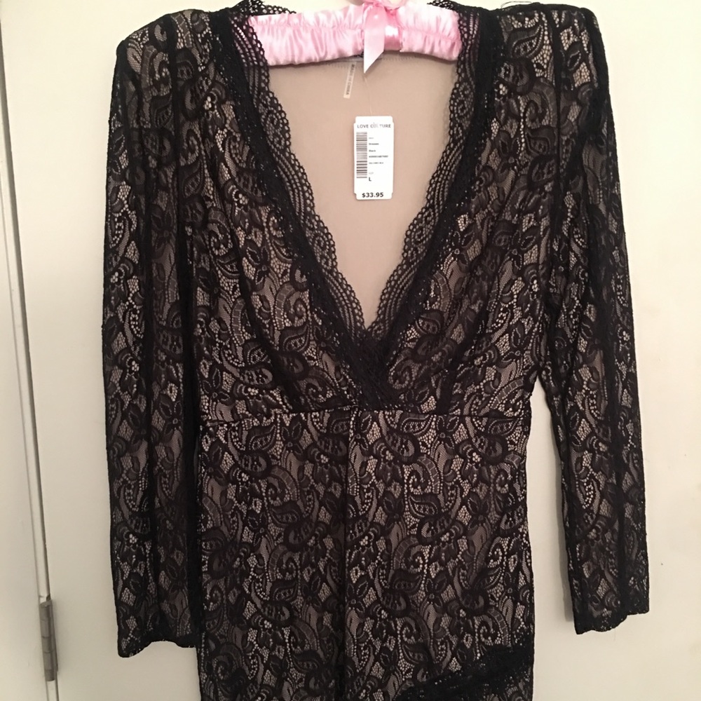 Super cute black lace dress with nude lining